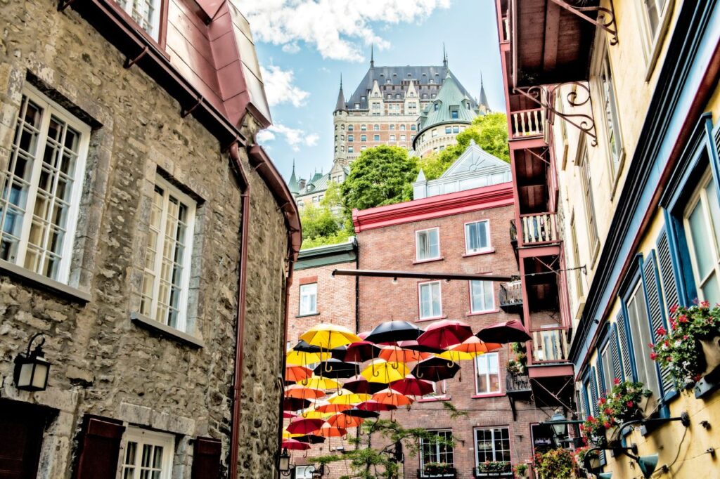 charming and romantic honeymoons in Canada start in Lot of Umbrellas in Petit Champlain street Quebec city, Canada