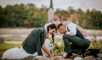 bride and groom plant tree during wedding unity ceremony
