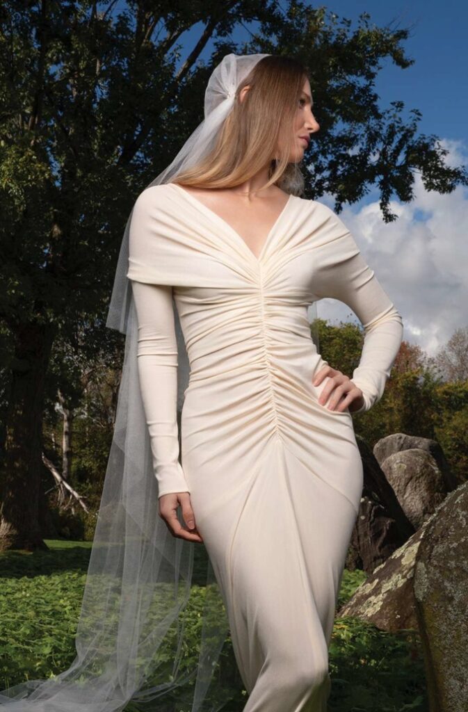 forest setting with bride wearing juliette cap and long sleeves ruched wedding dress