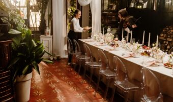long farm style table set up for rehearsal dinner, one of the best invitation to the rehearsal dinner