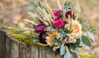 incredible rustic but luxe wedding bouquet with magenta and yellow wildflowers fall wedding trends