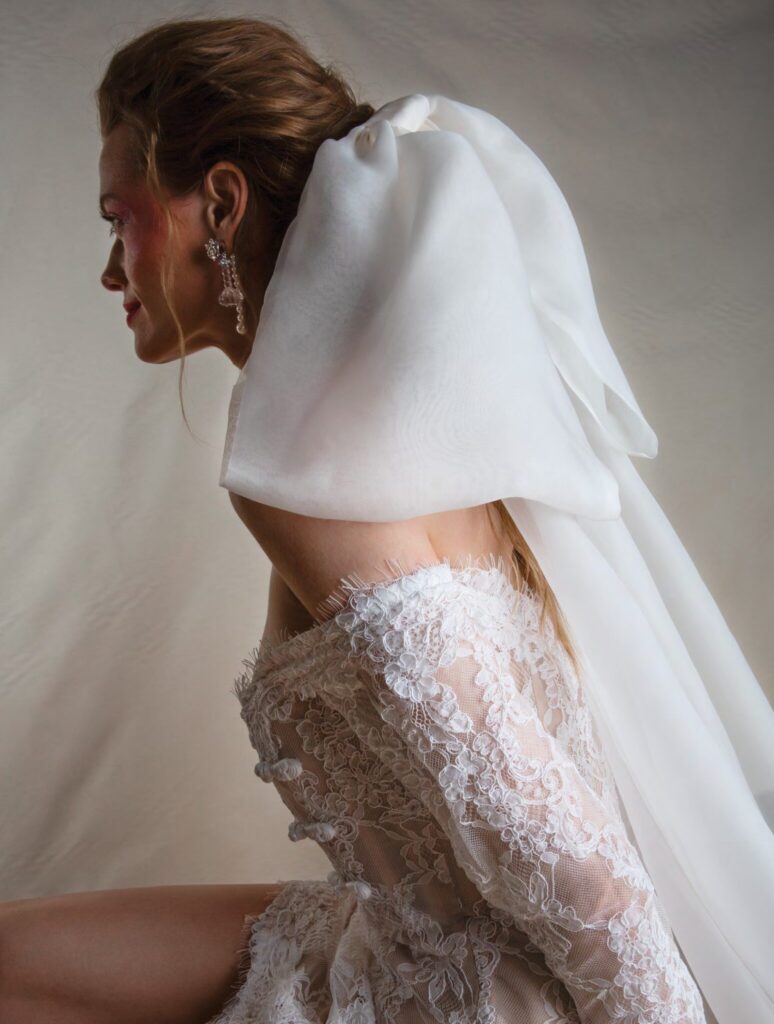 oversized bridal veil on bride with off the shoulder wedding dress