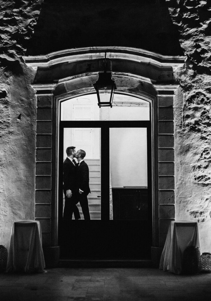 The French Connection destination wedding in France black and white portrait of two grooms