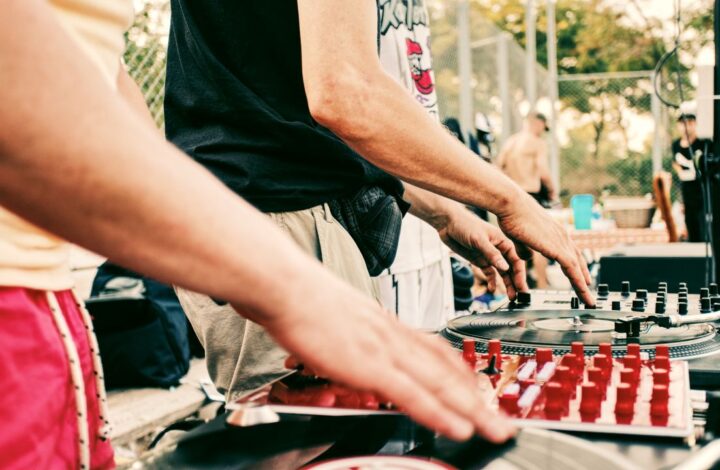 wedding entertainment trends including two wedding DJs battle