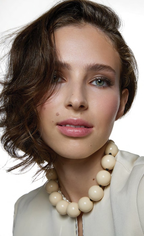 bride with short hair and soft neutral bridal makeup style