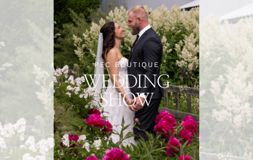 Bride and groom in wedding attire hold hands in a garden filled with pink and white flowers; overlaid with 'Wedding Show'.