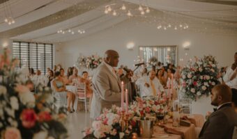 guests at wedding reception in their seats based on seating chart