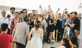 bride and groom get bombarded by wedding guests with mobile phones because they didn't do unplugged wedding