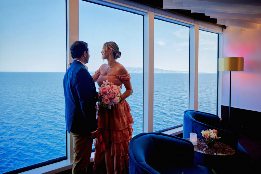 bride and groom portrait by windows at cruise weddings