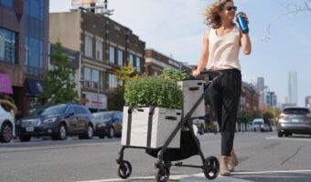 woman walking across street with rolling grocery cart by VOOMcart